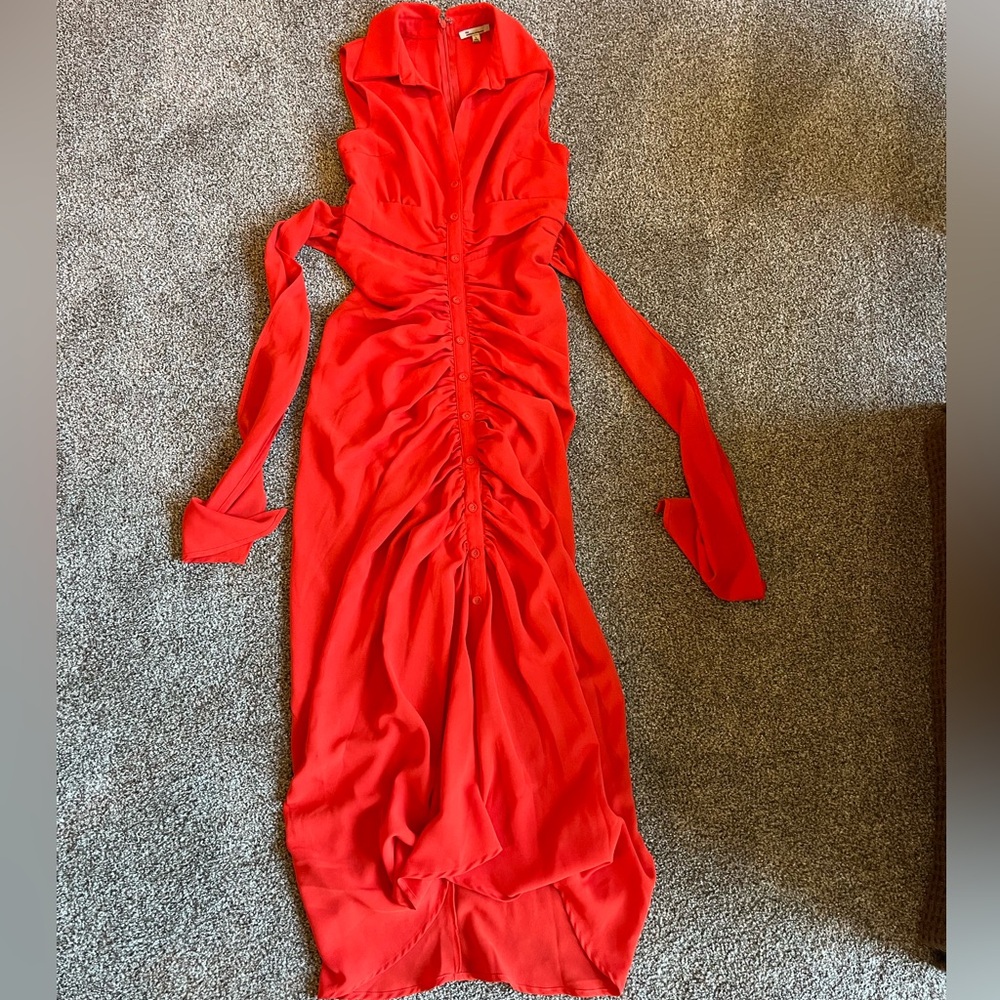 Show your curves off in this Large orange long dress by The Clothing Company